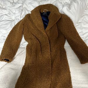 Fit:Classic fit.Hits at midthigh.Body length: 37 1/4".
Sleeve length: 32 1/2".